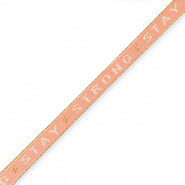 Nastro con testo "stay strong" rosso corallo-beige