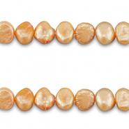Perle di acqua dolce pepita ovale pesca-arancione