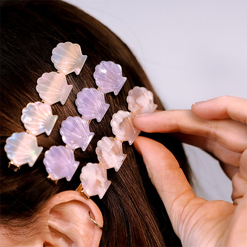 Crea look estivi unici con i nostri fermagli e pinze per capelli