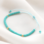 Accessori estivi da realizzare con cordoncino macram&egrave;, perle d&rsquo;acqua dolce e perline a forma di conchiglia: