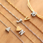 Crea cos&igrave; gioielli personalizzati con le nuove perline a lettere in acciaio inox: