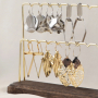 Idee creative per orecchini con ciondoli e distanziatori in oro e argento