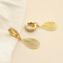 Creare orecchini eleganti con orecchini in ottone TQ