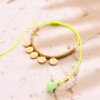 Ecco come incorporare le nappine in bracciali e cordoncini per occhiali da sole