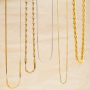 Combina collane e bracciali in acciaio inossidabile