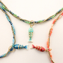 Mix & match con collana e orecchini con perline sfaccettate