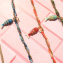 Mix & match con collana e orecchini con perline sfaccettate