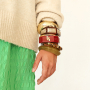 Mettiti all'opera per la tua arm party di braccialetti
