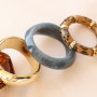 Mettiti all'opera per la tua arm party di braccialetti